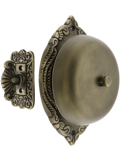 Transitional Victorian Mechanical Door Bell in Antique Brass.